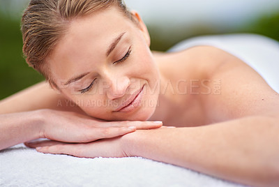 Buy stock photo Massage, woman and spa for detox, wellness and relaxation in muscles, back and neck for self care. Female person, physical therapy and health for body with smile, calm and happiness on holiday