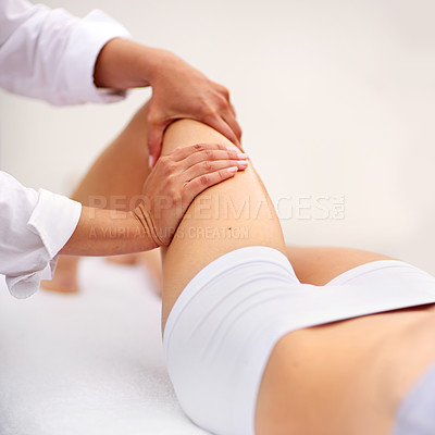 Buy stock photo Cropped shot of a woman enjyoing a massage at the day spa