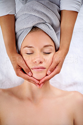 Buy stock photo Woman, face and massage table in spa, therapy and self care for beauty salon or wellness and resting. Comfortable and resort with client, stress free and healing, calm session and cosmetology