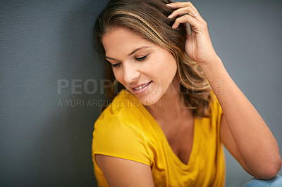 Buy stock photo Wall, smile and woman on floor, relax and rest for weekend, Gen z and streetwear for fashion in house. Grey background, clothes and girl in apartment, cheerful and comfortable on ground of home