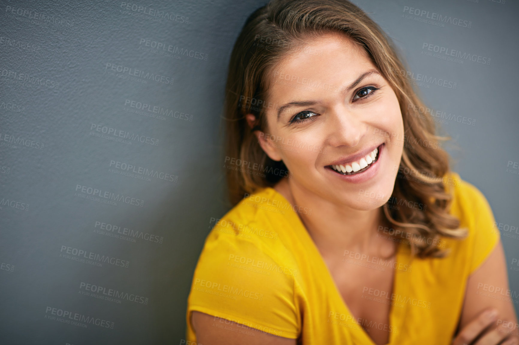 Buy stock photo Wall, joy and woman on floor, portrait and relax for weekend, Gen z and streetwear for fashion in house. Grey background, happiness and girl in apartment, cheerful and comfortable on ground of home