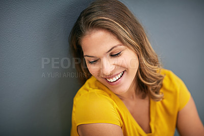 Buy stock photo Woman, happiness and thinking on studio backdrop for relax, memory and smile on mockup space. Female person, remember and nostalgia by grey background for daydream, ideas and laughing at joke