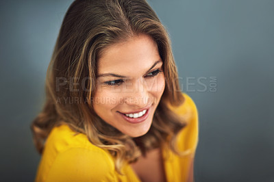 Buy stock photo Woman, smile and thinking on studio backdrop for relax, memory and happiness on mockup space. Female person, laugh and nostalgia by grey background for daydream, comedy and remember joke with pride