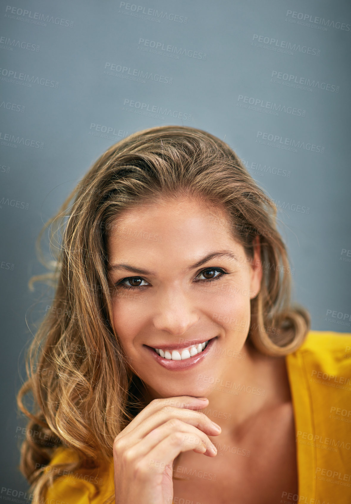 Buy stock photo Portrait, woman and happy in background in studio in confidence, pride and smile on grey backdrop in Italy. Female person, cheerful and closeup as graphic designer in Milan for company or business
