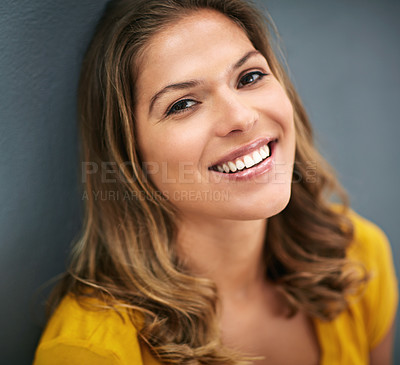 Buy stock photo Studio, smile and portrait of woman, relax and lipstick of cosmetics, beauty and pride on wall. Grey background, makeup and girl with joy for face, confidence and cheerful for break, week and USA