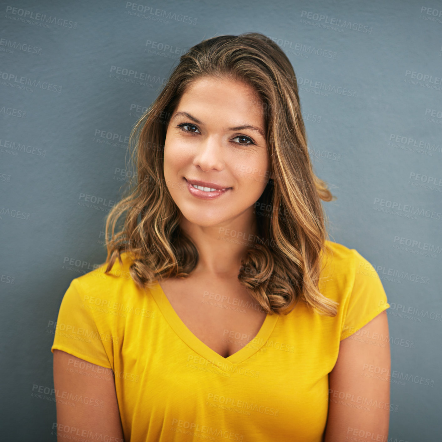 Buy stock photo Studio, happy and portrait of woman, relax and lipstick of cosmetics, beauty and pride on wall. Grey background, makeup and girl with smile for face, confidence and cheerful for break, model and USA