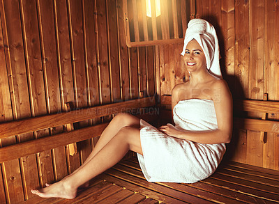 Buy stock photo Full length portrait of a young woman relaxing in the sauna at a spa