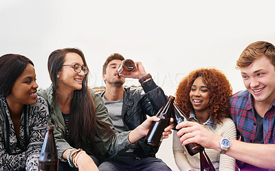Buy stock photo Friends, beer and drinking for celebration outdoor, bonding and fun with people together at party, social event or gathering. Happy, cheers for success or achievement, support and trust with alcohol