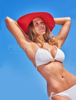 Buy stock photo Woman, bikini and sky at beach with hat in summer or hot weather on holiday, break and rest in Bali. Below, female person and body in swimwear on trip, vacation and travel to relax and chill