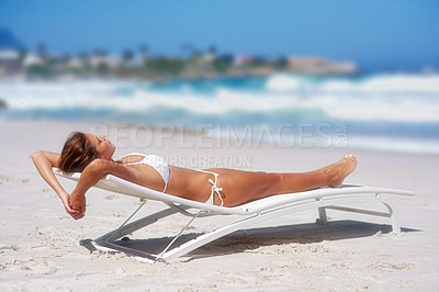 Buy stock photo Woman, holiday and vacation with bikini for sun bathing, tanning and fun on tropical island. Female person, swimsuit and summer in travel, health or calm with relax, outdoor or adventure on beach bed