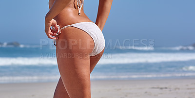 Buy stock photo Buttocks, beach and blue sky with woman in swimwear for holiday, travel or Miami vacation in summer. Bikini, bottom and tourist person outdoor by ocean sea on space for relax or wellness in nature