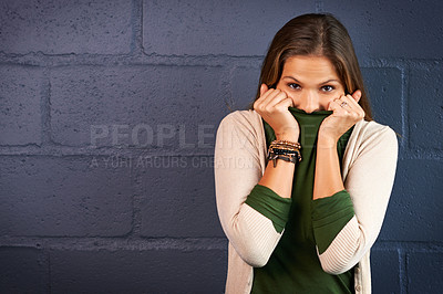 Buy stock photo Portrait, woman and cover mouth by wall with outfit for shy personality with fashion career. Style, nervous and female designer with trendy clothes by gray brick background with mockup space.