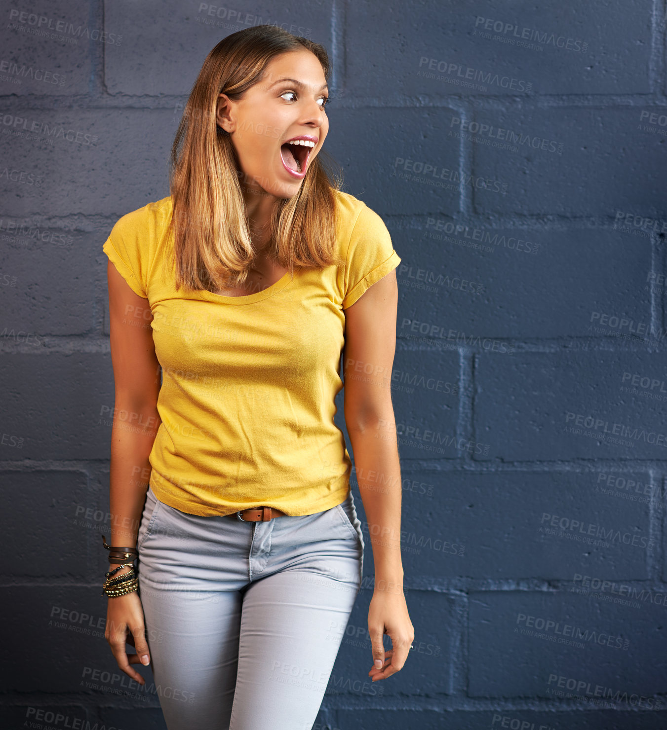 Buy stock photo Woman, wow and shock expression by brick wall with announcement, mind blown and omg for secret. Female person, surprise and wtf for gossip with crazy story, emoji and did you know by dark background