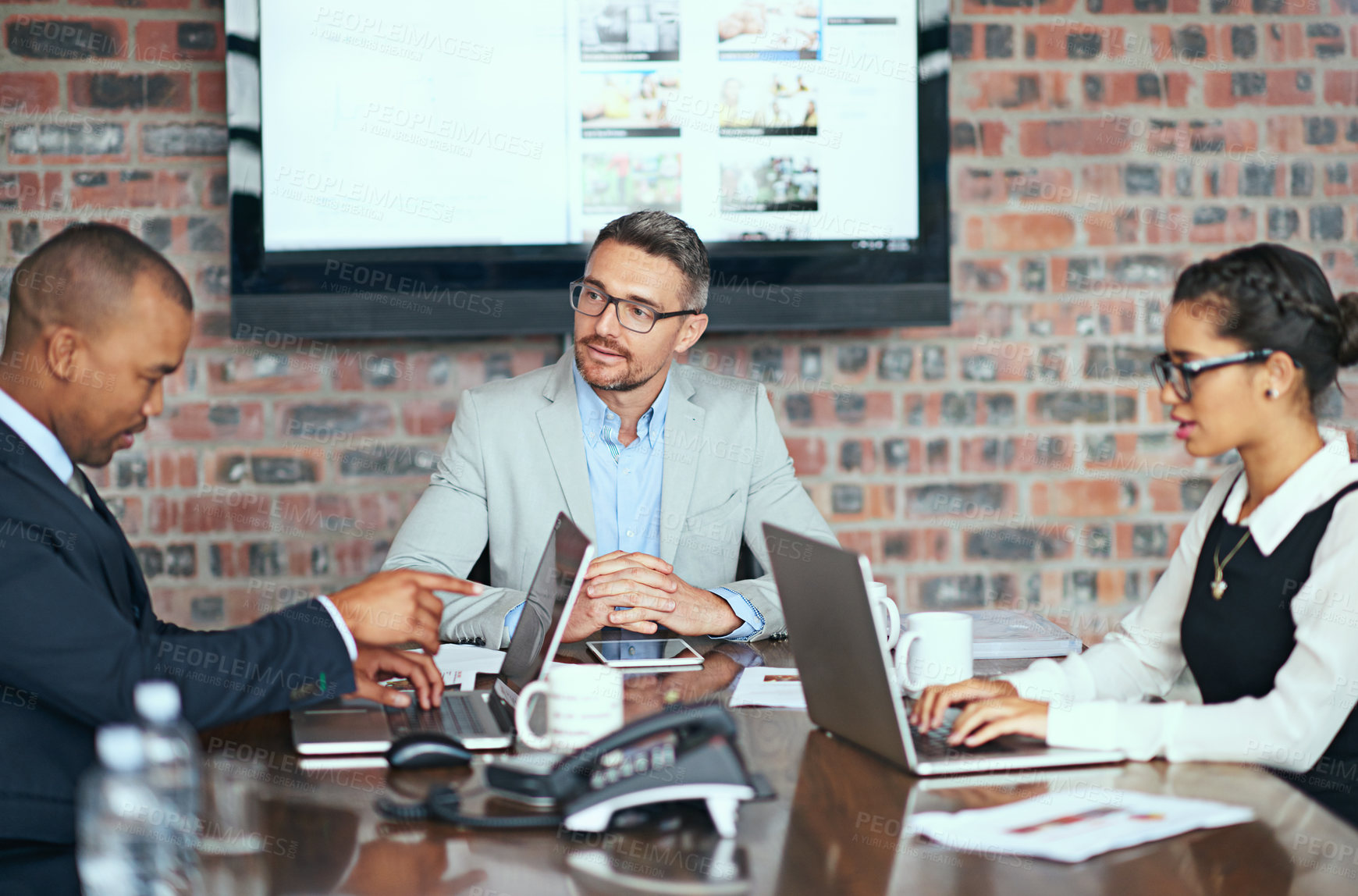 Buy stock photo Business people, meeting and laptop in boardroom with planning, ideas and review for csi project. Men, woman and computer for brainstorming with charity, community or society with diversity in office