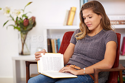 Buy stock photo Novel, relax or woman reading book in home for alone time, rest break or studying information in Spain. Girl, chair or female person with fiction story, page or peace for knowledge, fantasy or hobby