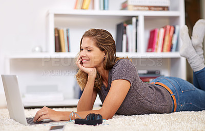 Buy stock photo Happy, streaming or girl on laptop in home to relax with internet connection for film, video or movie online. Smile, website blog and woman on social media and technology for subscription in house