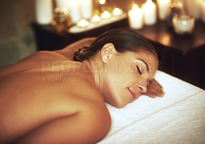 Buy stock photo Relaxing, woman and zen in salon for treatment, massage and wellness with cosmetics. Candles, luxury and sleeping with peace after aromatherapy, deep tissue and body care for glow and beauty
