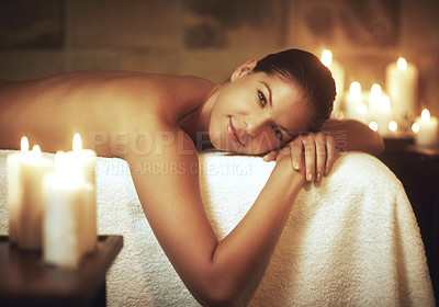 Buy stock photo Portrait, relax and spa with woman, wellness and luxury with vacation, candles and weekend break. Face, body treatment and person with holiday, smile and girl with massage, stress relief and healthy
