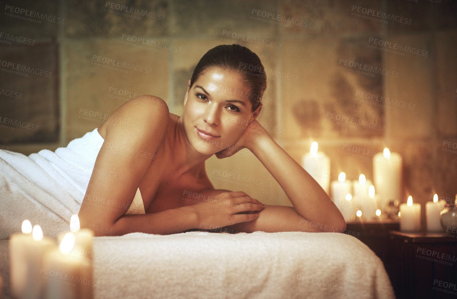 Buy stock photo Portrait, luxury and spa with woman, wellness and health with vacation, relax and weekend break. Face, body treatment and person with holiday, smile and girl with massage, stress relief and candles