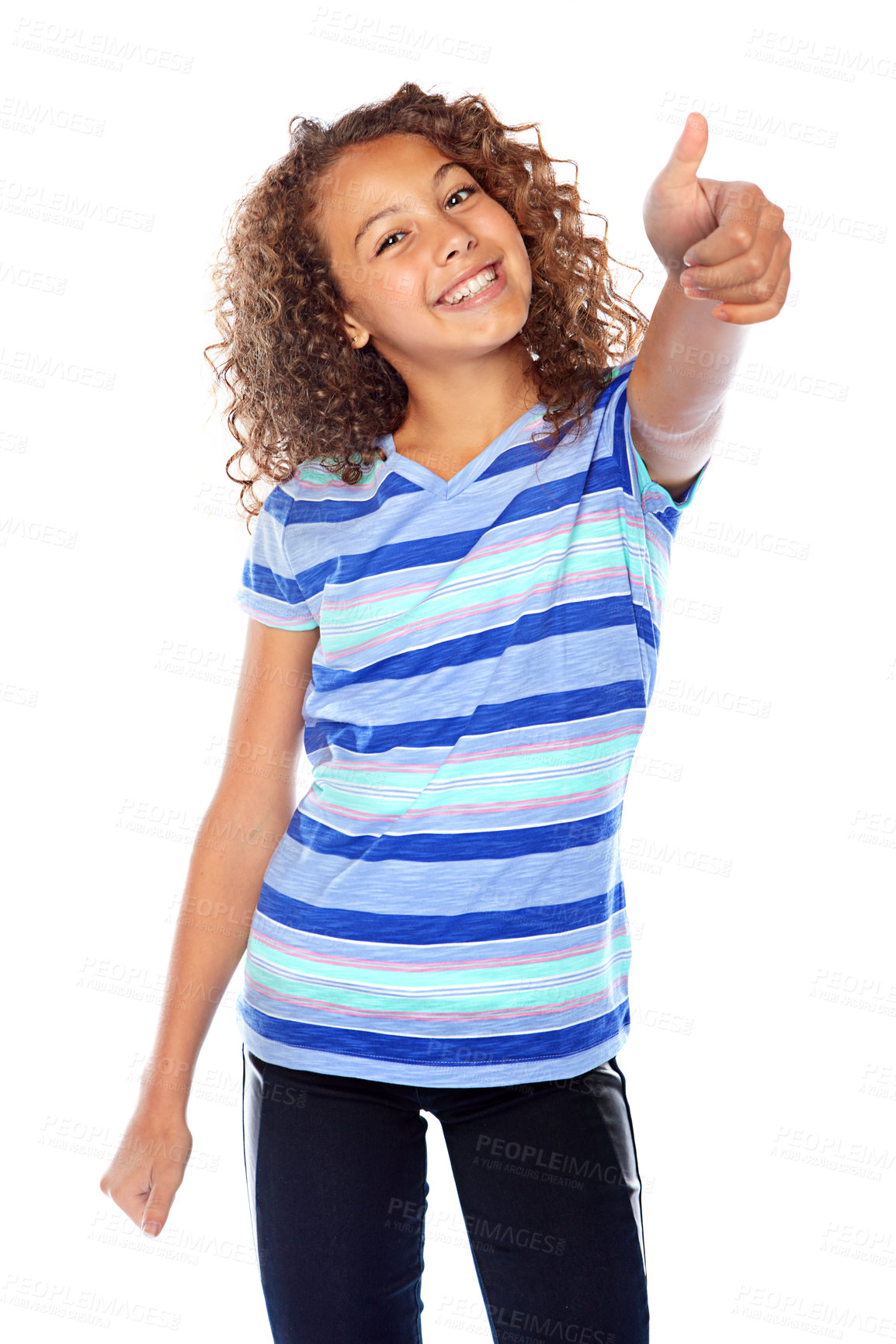 Buy stock photo Studio shot of a young girl giving a thumbs up against a white background