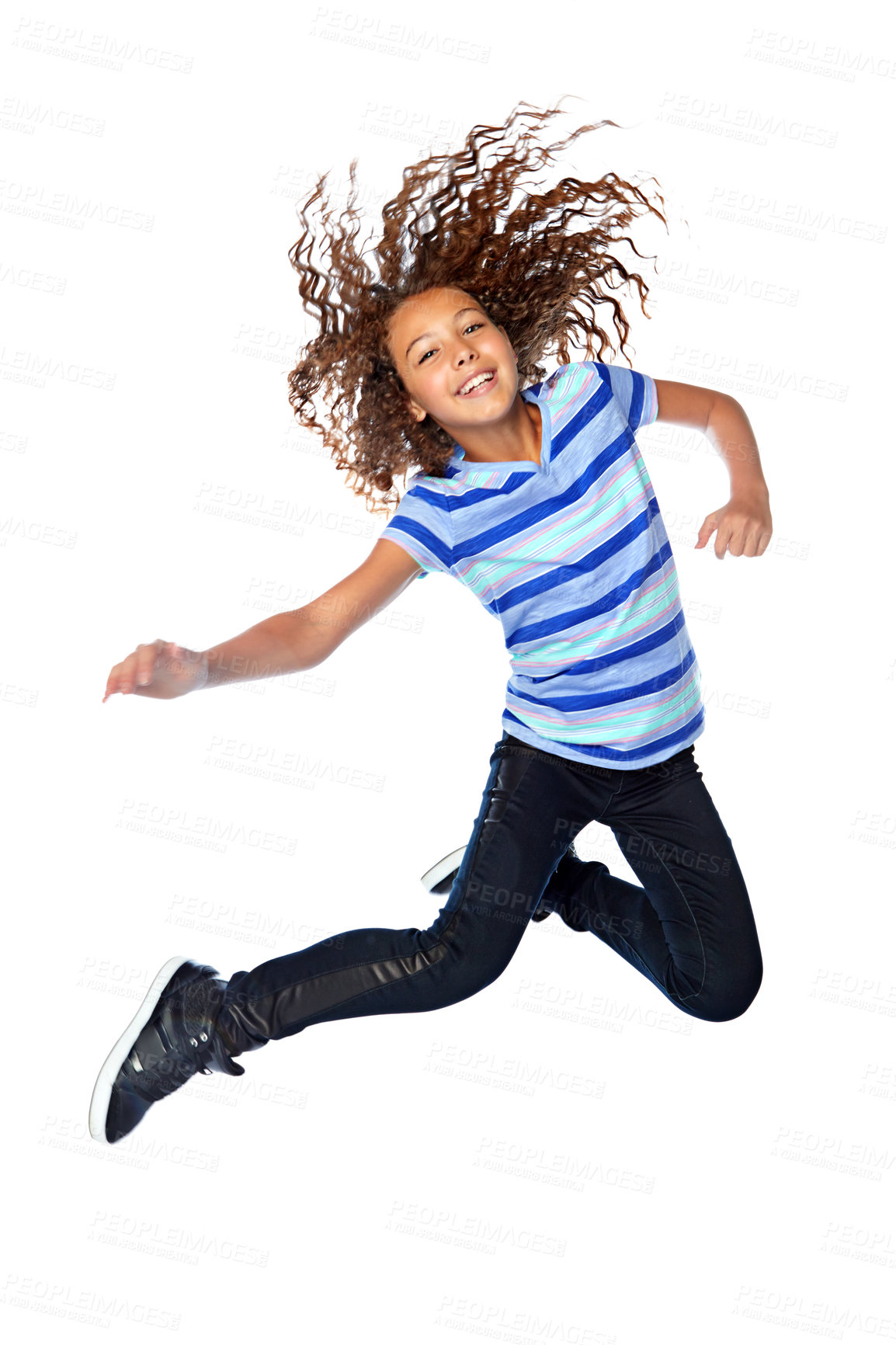 Buy stock photo Studio shot of a young girl jumping for joy against a white background