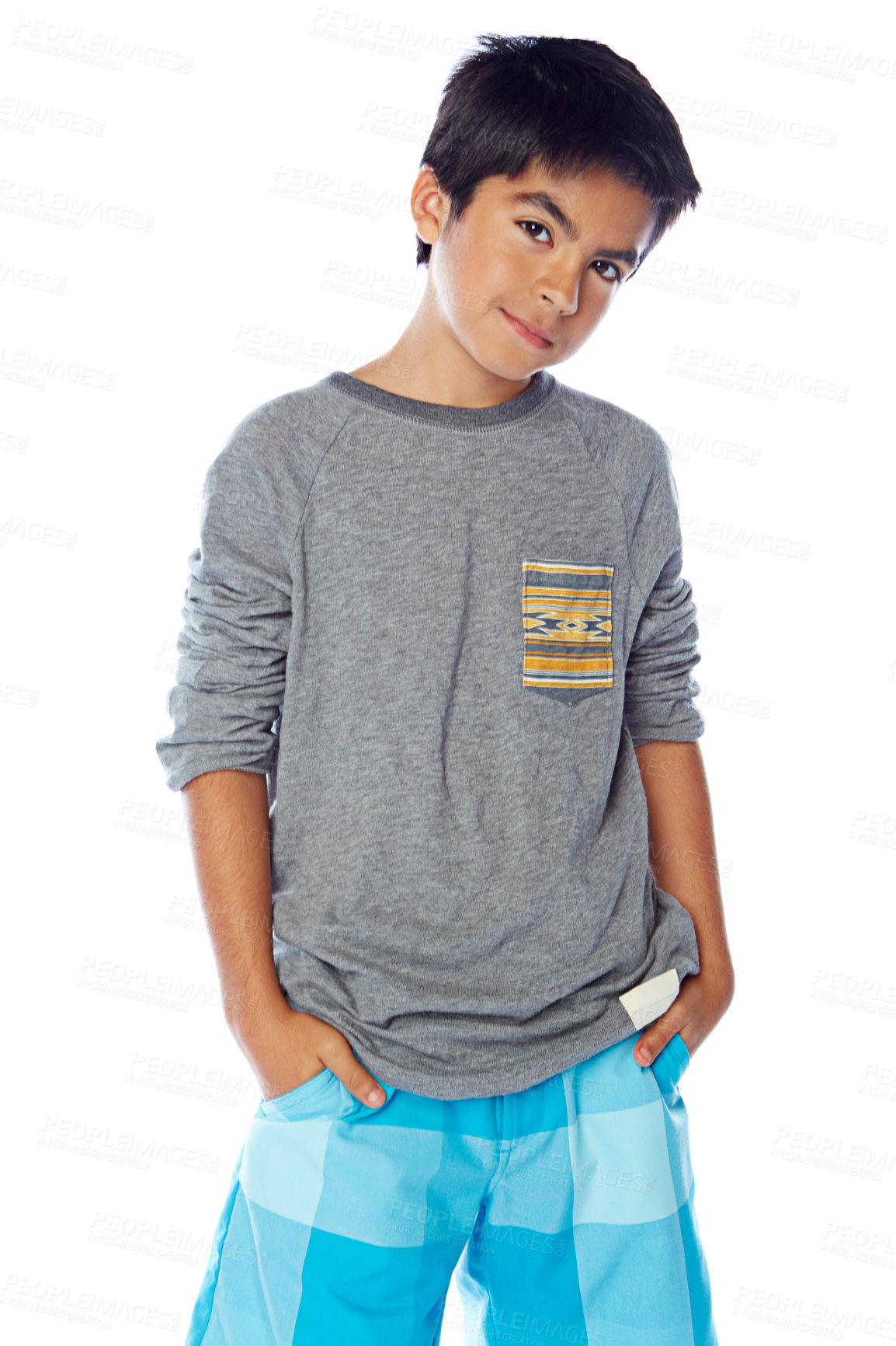 Buy stock photo Studio portrait of a young boy posing against a white background