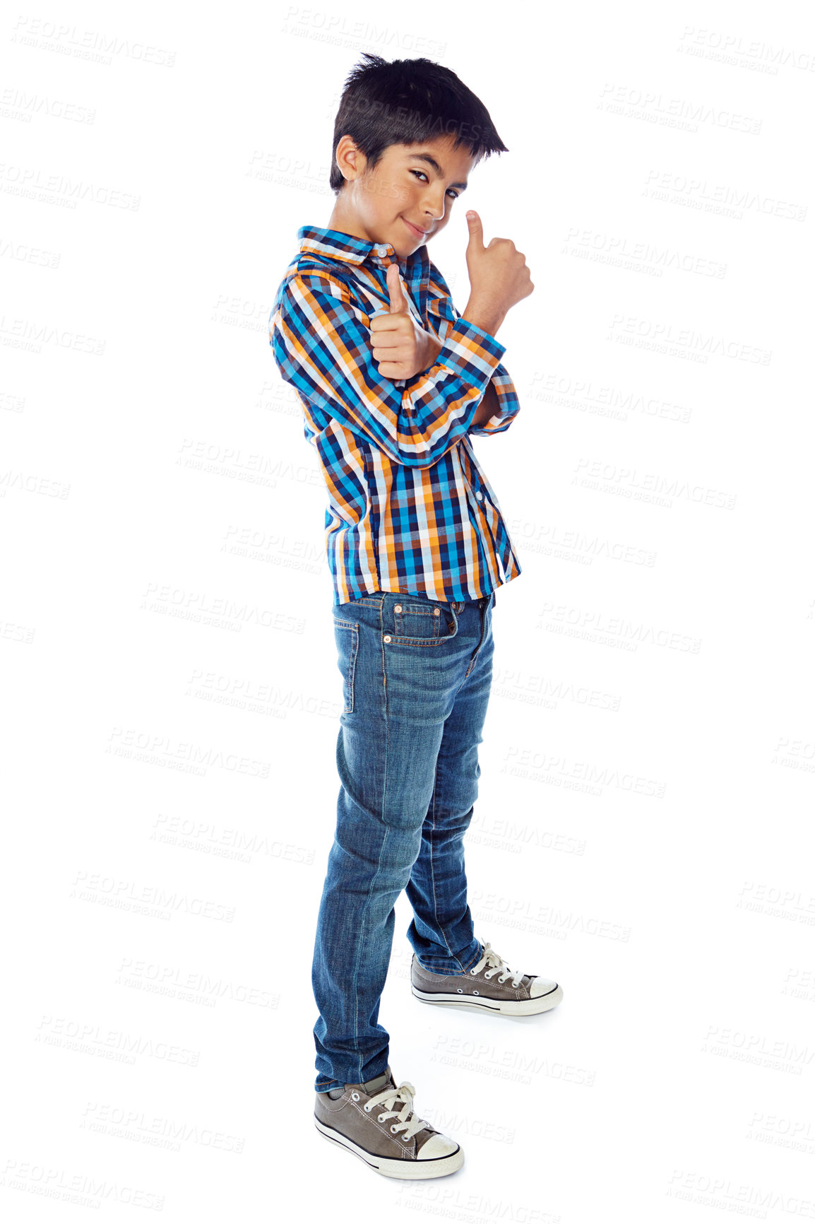 Buy stock photo Studio shot of a young boy giving a thumbs up against a white background