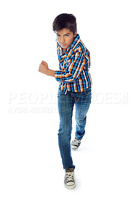 Buy stock photo Studio portrait of a young boy running against a white background