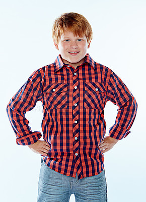 Buy stock photo Studio portrait of a young boy posing against a white background