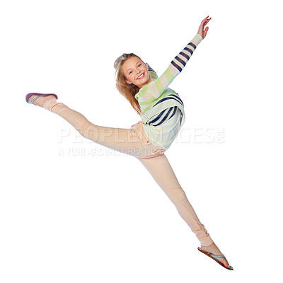 Buy stock photo Studio shot of a young girl jumping for joy against a white background