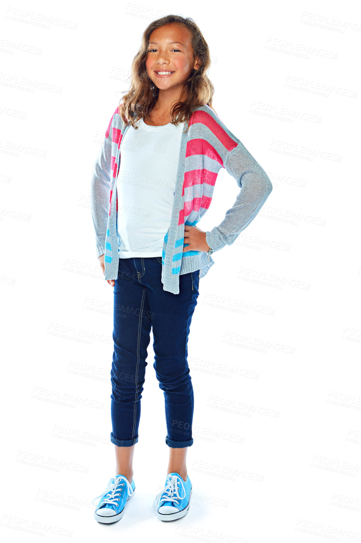 Buy stock photo Studio portrait of a young girl posing against a white background