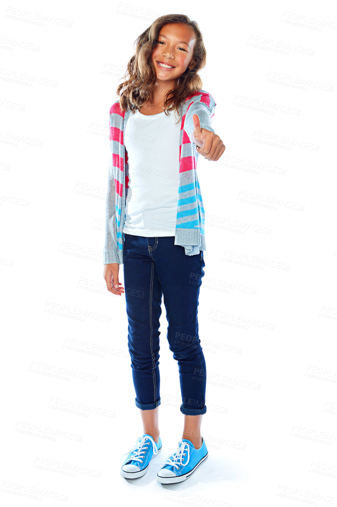 Buy stock photo Studio shot of a young girl giving a thumbs up against a white background