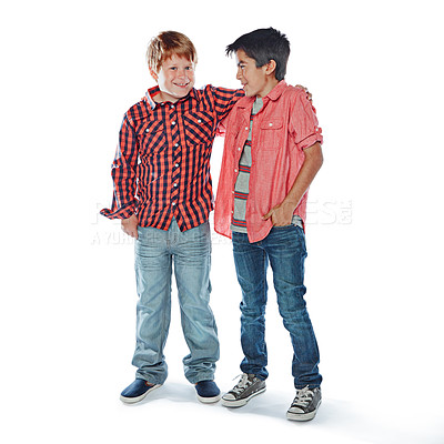 Buy stock photo Studio portrait of two best friends posing against a white background