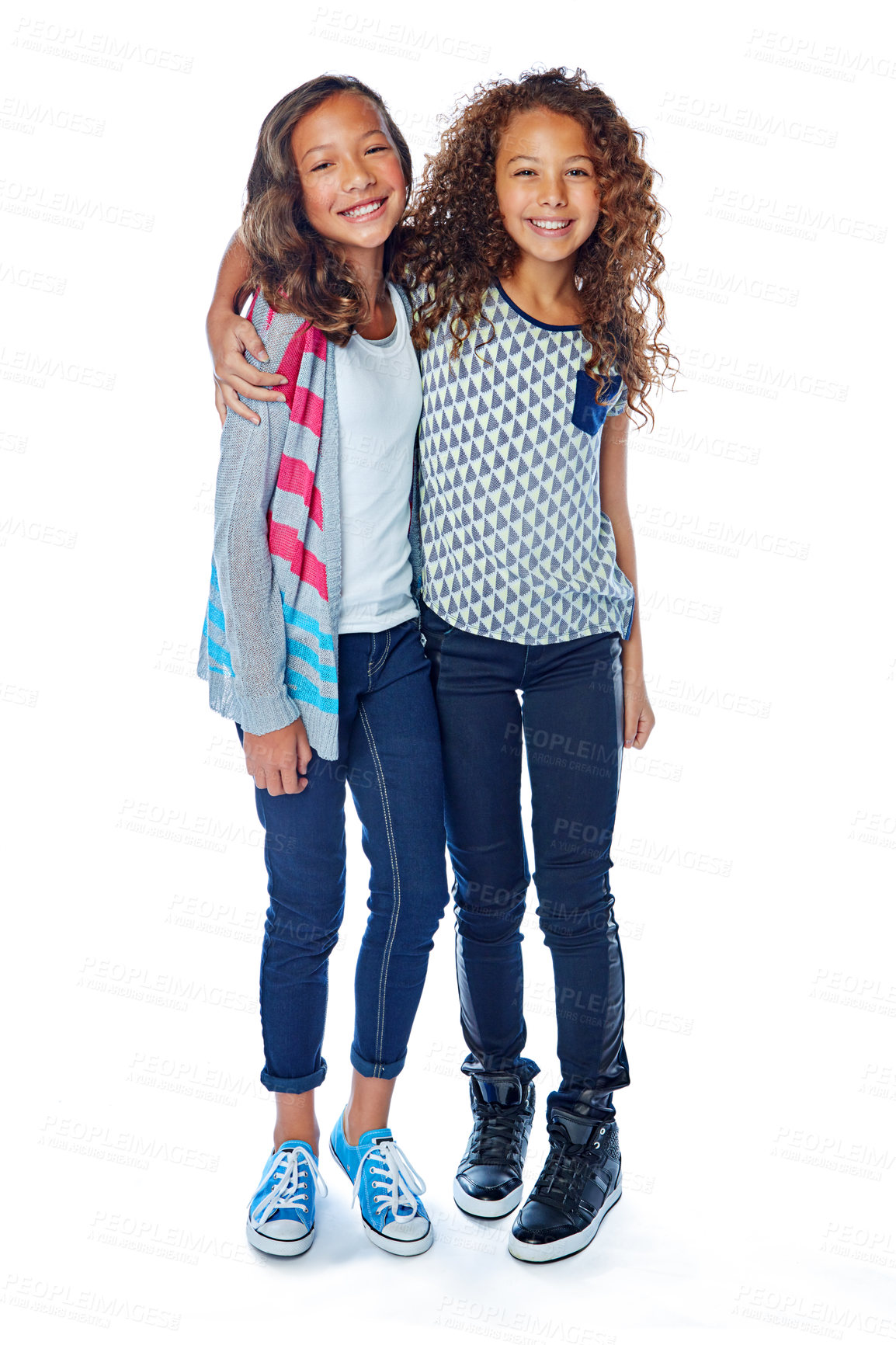 Buy stock photo Studio portrait of two best friends posing against a white background