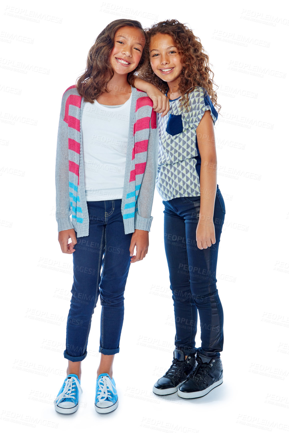 Buy stock photo Studio portrait of two best friends posing against a white background