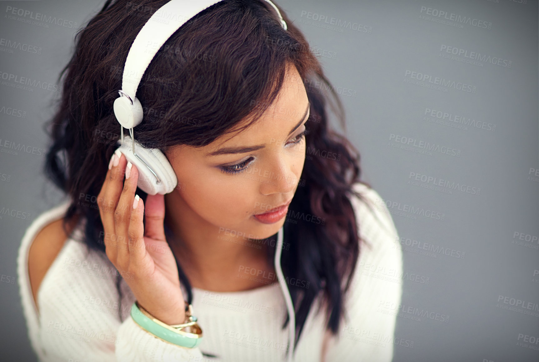 Buy stock photo Girl, listening and streaming music with headphones and app for easy download of audio or podcast. Mockup, woman or relax with hip hop artist on website with album sound or kpop musician on playlist