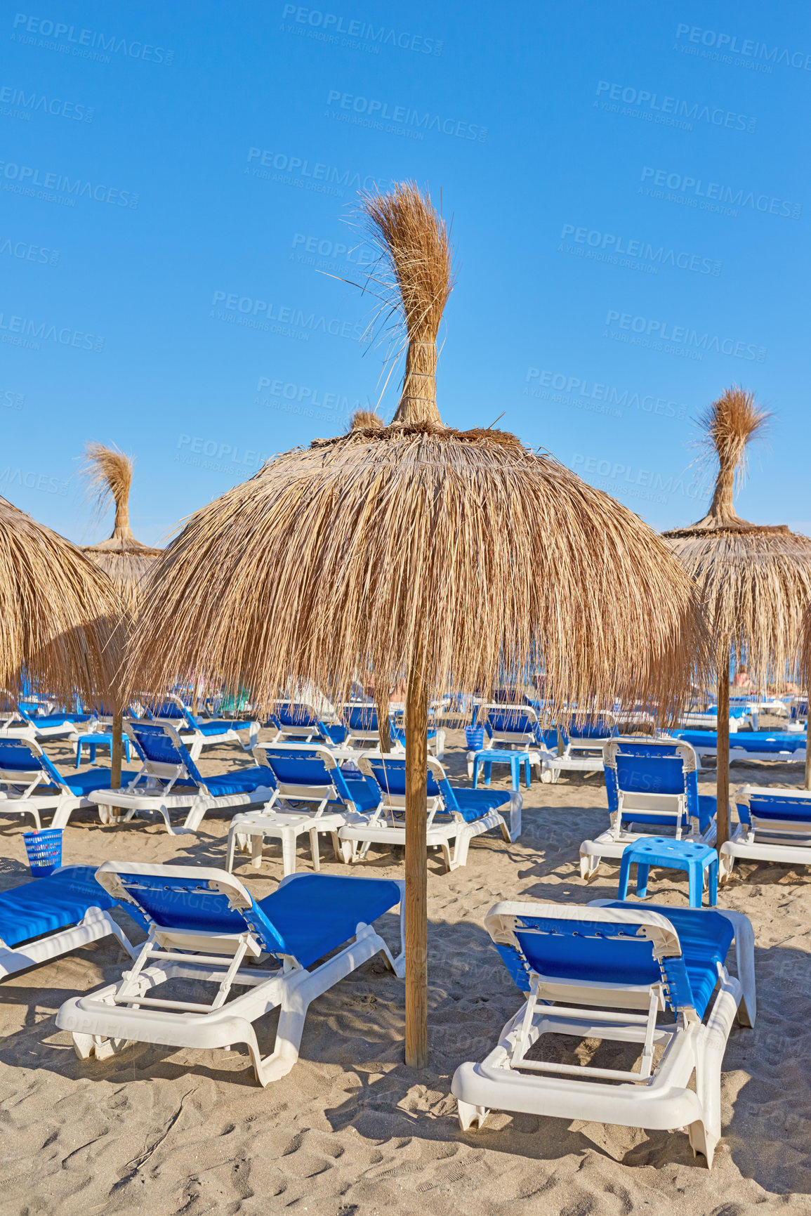 Buy stock photo Beach chair, summer and umbrella with vacation, resort and luxury hotel with sand and lounge area. Sea, ocean and villa with sun, tourism and weekend break for Spain getaway and tropical trip 