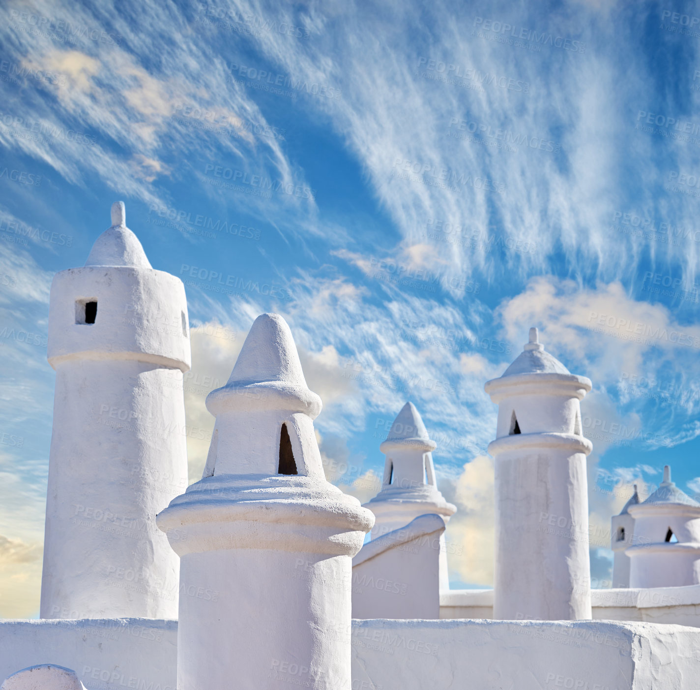 Buy stock photo Beautiful chimneys and ventilation tubes in the city of Colahonda, Andalusia, Spain