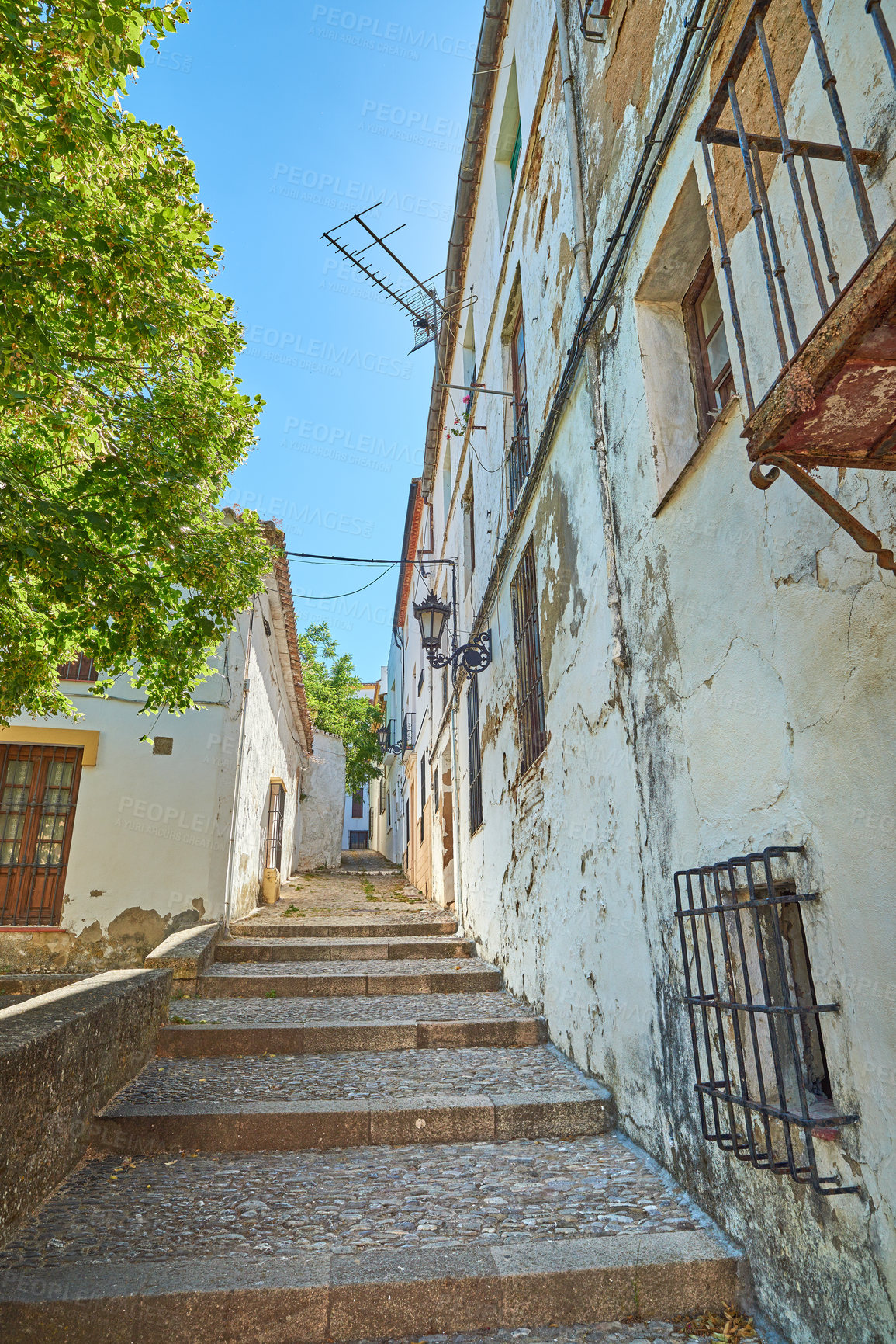 Buy stock photo Architecture, ancient and stairs in city of Spain for tourism, adventure and travel destination. Background, steps and vintage, old and building in town for culture, design and traditional structure