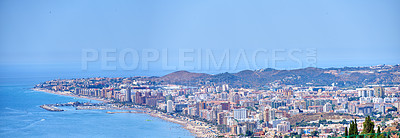 Buy stock photo Ocean, buildings and aerial of city in Spain with urban structures, streets and skyscrapers. Cityscape, architecture and landscape of town for adventure, travel destination and tourism by seaside