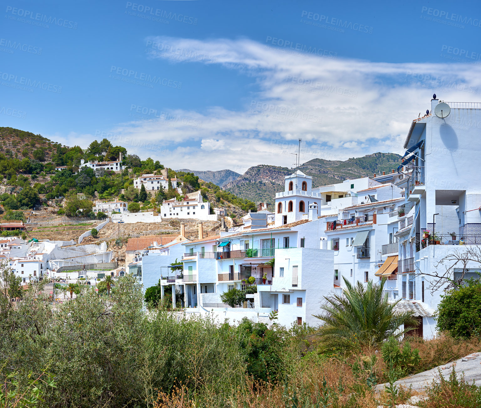 Buy stock photo Mountain, buildings and city in Spain on hill with urban structures, houses and property development. Travel, architecture and landscape of town for adventure, holiday destination or tourism outdoors