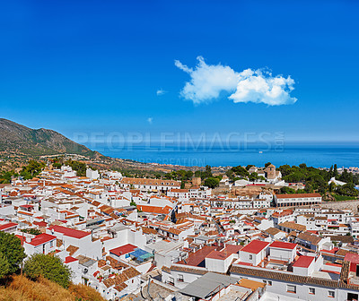 Buy stock photo Mountain, buildings and city in Spain by ocean with urban structures, houses and property. Cityscape, architecture and landscape of town for adventure, travel destination and tourism in nature