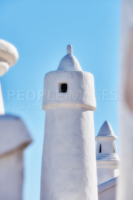 Buy stock photo Architecture, chimney and roof on home in Spain outdoor for travel, vacation and tourism at village in Andalusia. Traditional, rooftop and building for history, culture and blue sky at house closeup