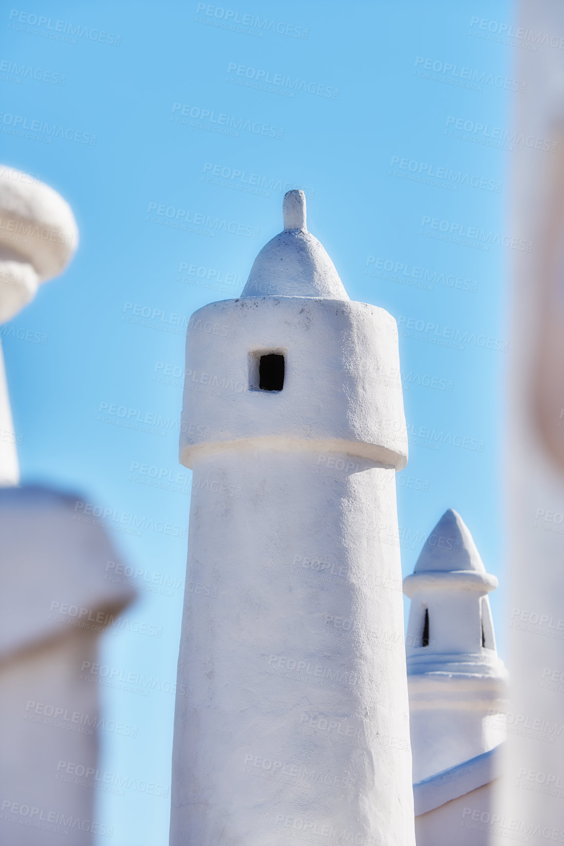 Buy stock photo Architecture, chimney and roof on home in Spain outdoor for travel, vacation and tourism at village in Andalusia. Traditional, rooftop and building for history, culture and blue sky at house closeup