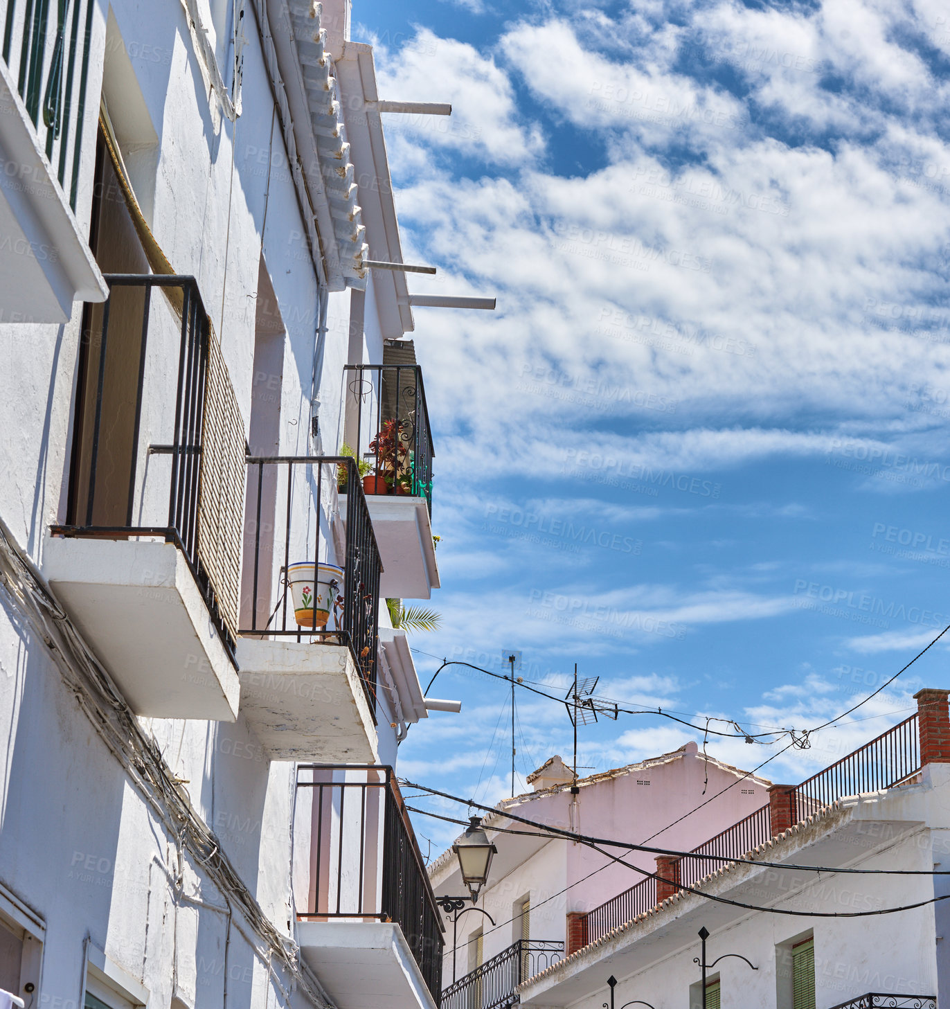 Buy stock photo History, sky and balcony on house for architecture, buildings and travel in Spain. Frigiliana, wallpaper and village design with heritage for exploration, culture or whitewash in Europe for aesthetic