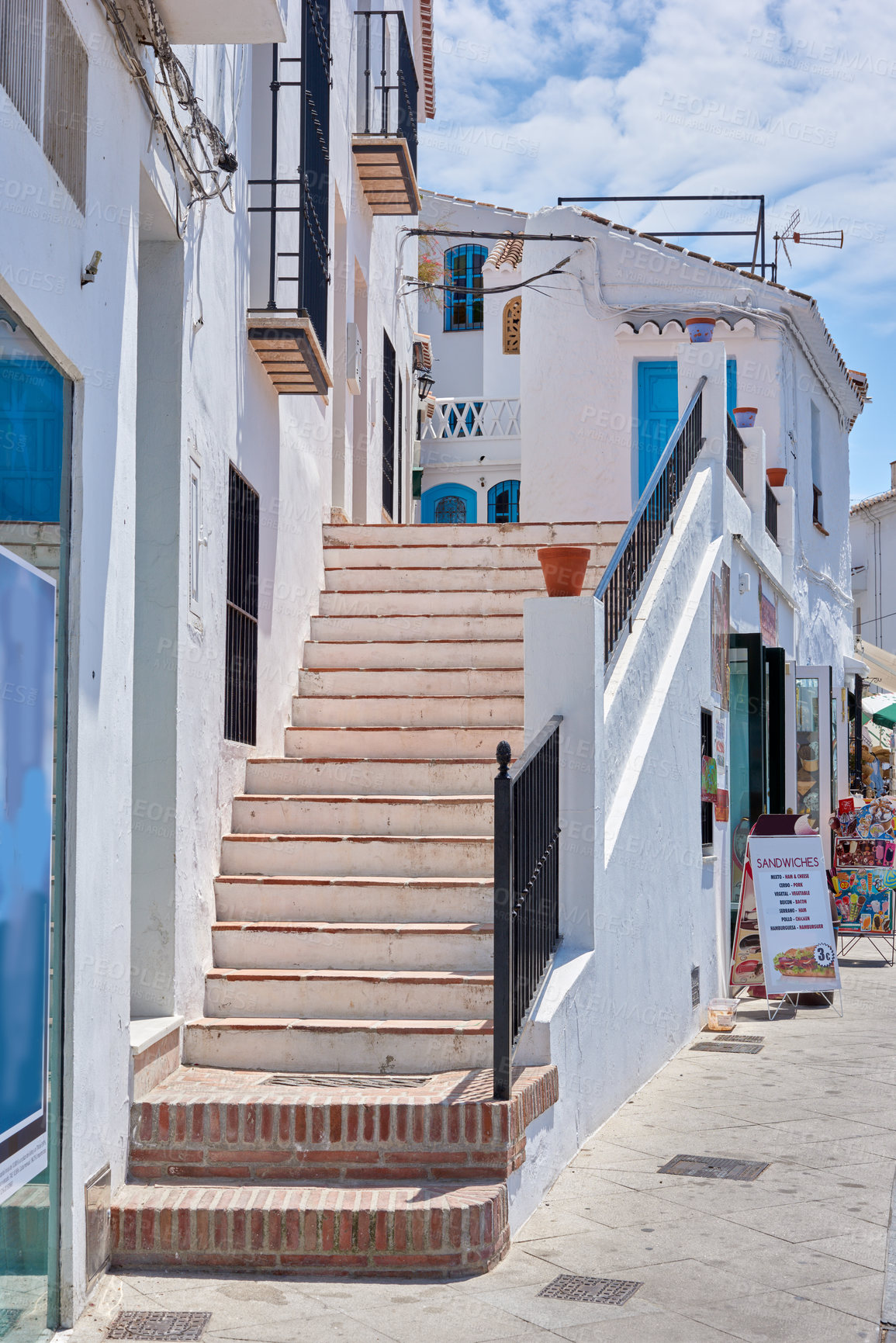 Buy stock photo Steps, town and outdoor architecture on vacation, Europe summer and historical culture on getaway. Stairs, city and traditional buildings in destination, tourism and urban holiday in Frigiliana