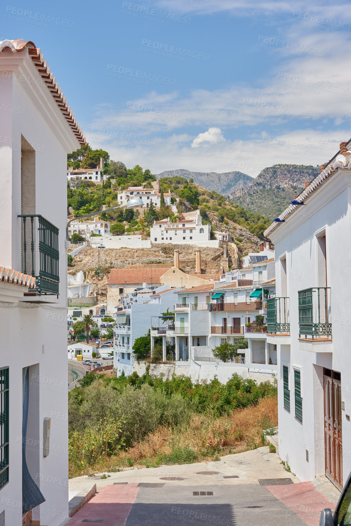 Buy stock photo Street, mountain and travel with old city, adventure and journey with nature, Frigiliana and Andalusia. Spain, empty and buildings with architecture, outdoor and road with vacation and summer holiday