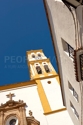 Buy stock photo Modern, church and architecture building with blue sky of ancient travel, religious location and history pilgrimage. Above, traditional design and cultural structure, catholic worship and Spain faith