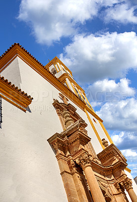 Buy stock photo Modern, building and architecture church with blue sky of ancient travel, religious location and history pilgrimage. Above, traditional design and cultural structure, catholic worship and Spain faith