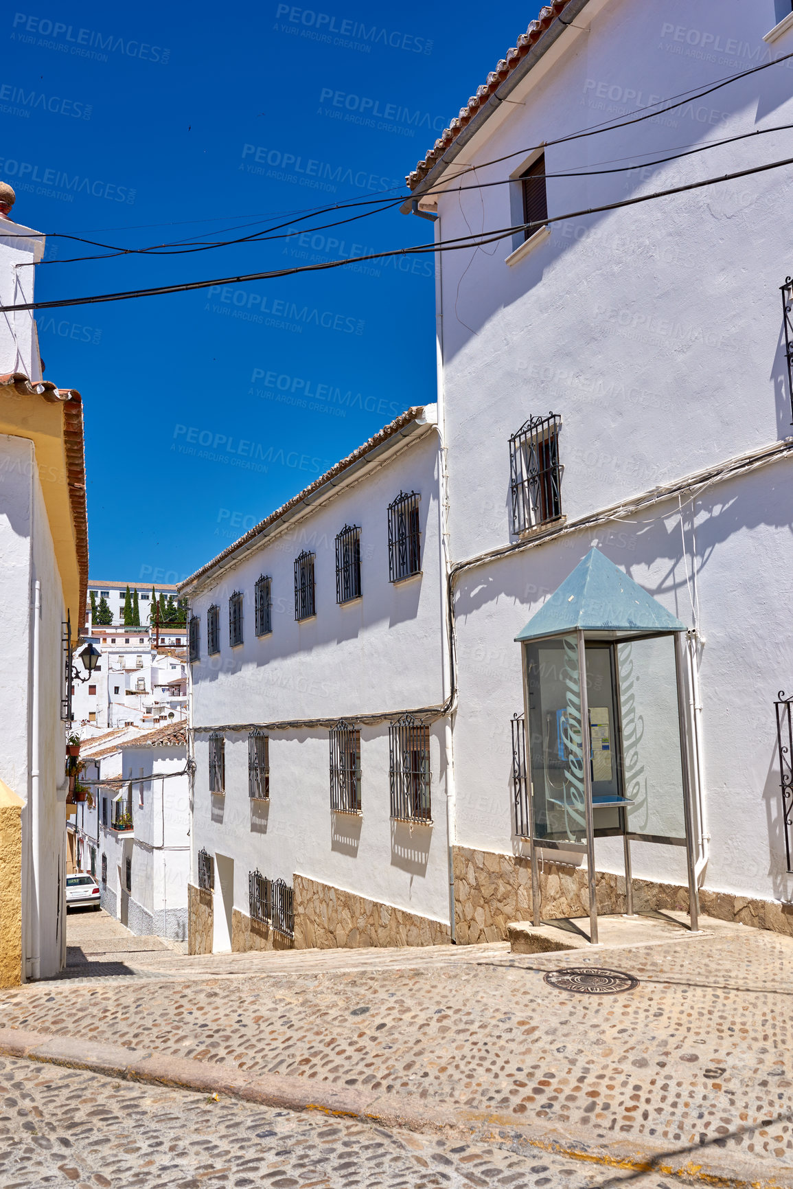 Buy stock photo Travel, buildings and architecture of narrow street for ancient town, history tourism and vintage location. Urban, neighborhood and city with traditional culture, holiday sky and destination in Spain